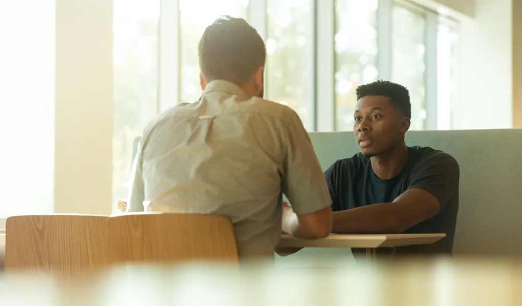 Two men discussing best careers for the future