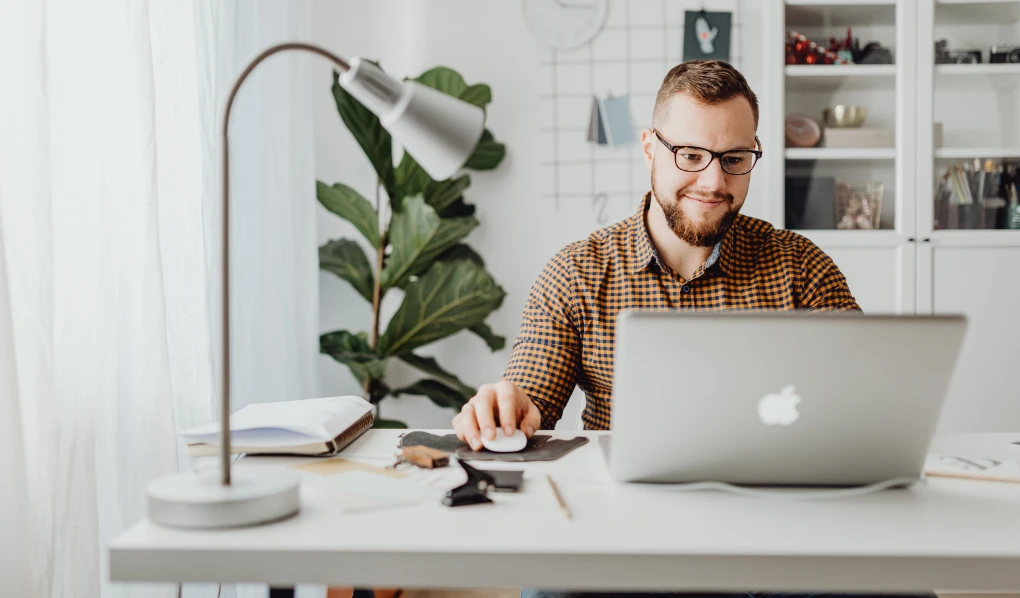 Online student looking at assignment help hub on laptop