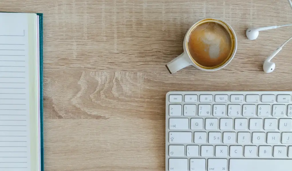 Coffee, notebook and keyboard