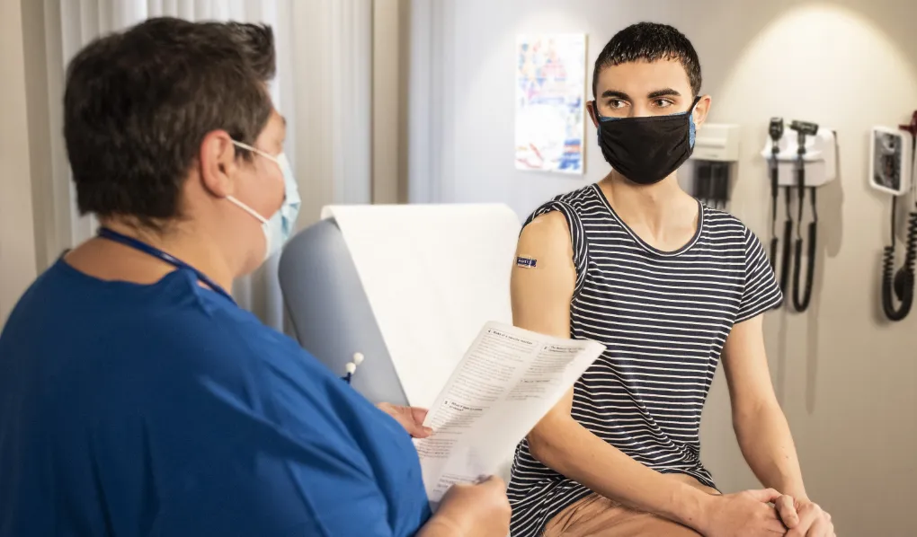 Graduate Diploma Nurse seeing a patient