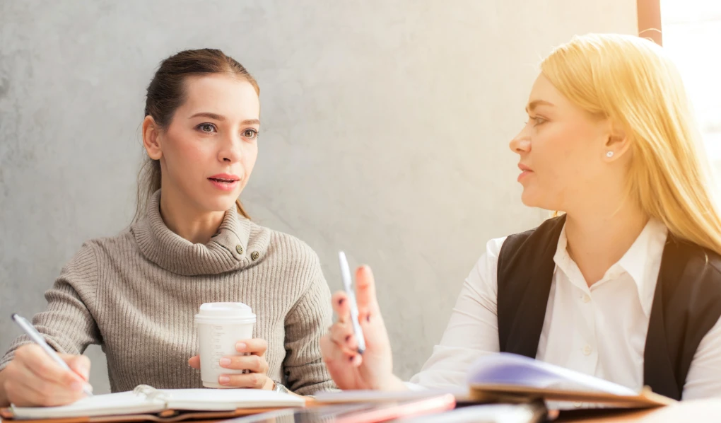 Female colleagues having discussion