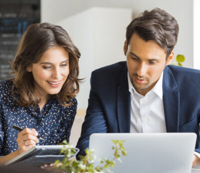 Young-male-and-female-in-office-setting