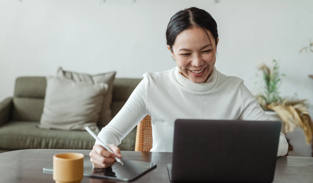 Young psychology student studying online with laptop