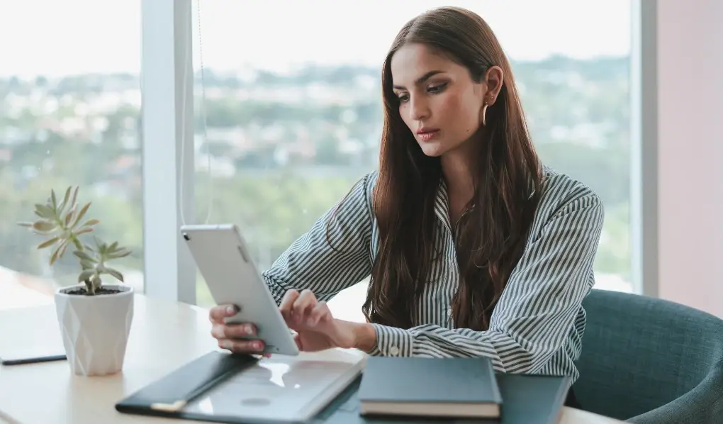 Human resources career woman checking ipad