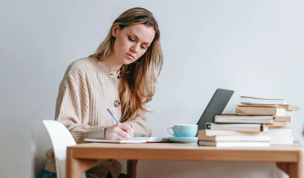 Online student studying a graduate diploma