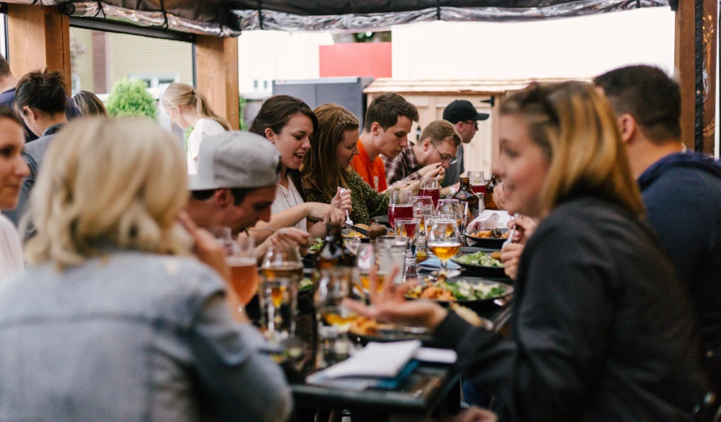 Group of people having lunch at a restaurant