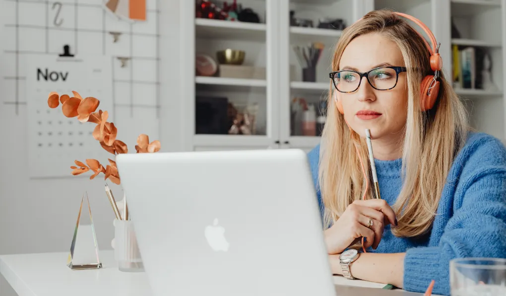 Woman looking pensive while studying