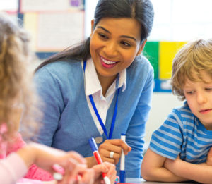 female-teacher-two-children