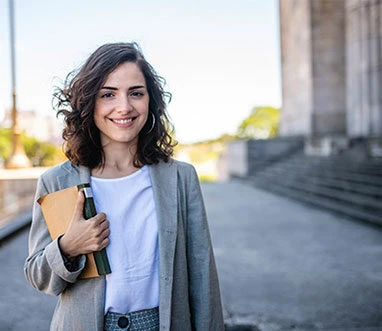 Law student holding notebook