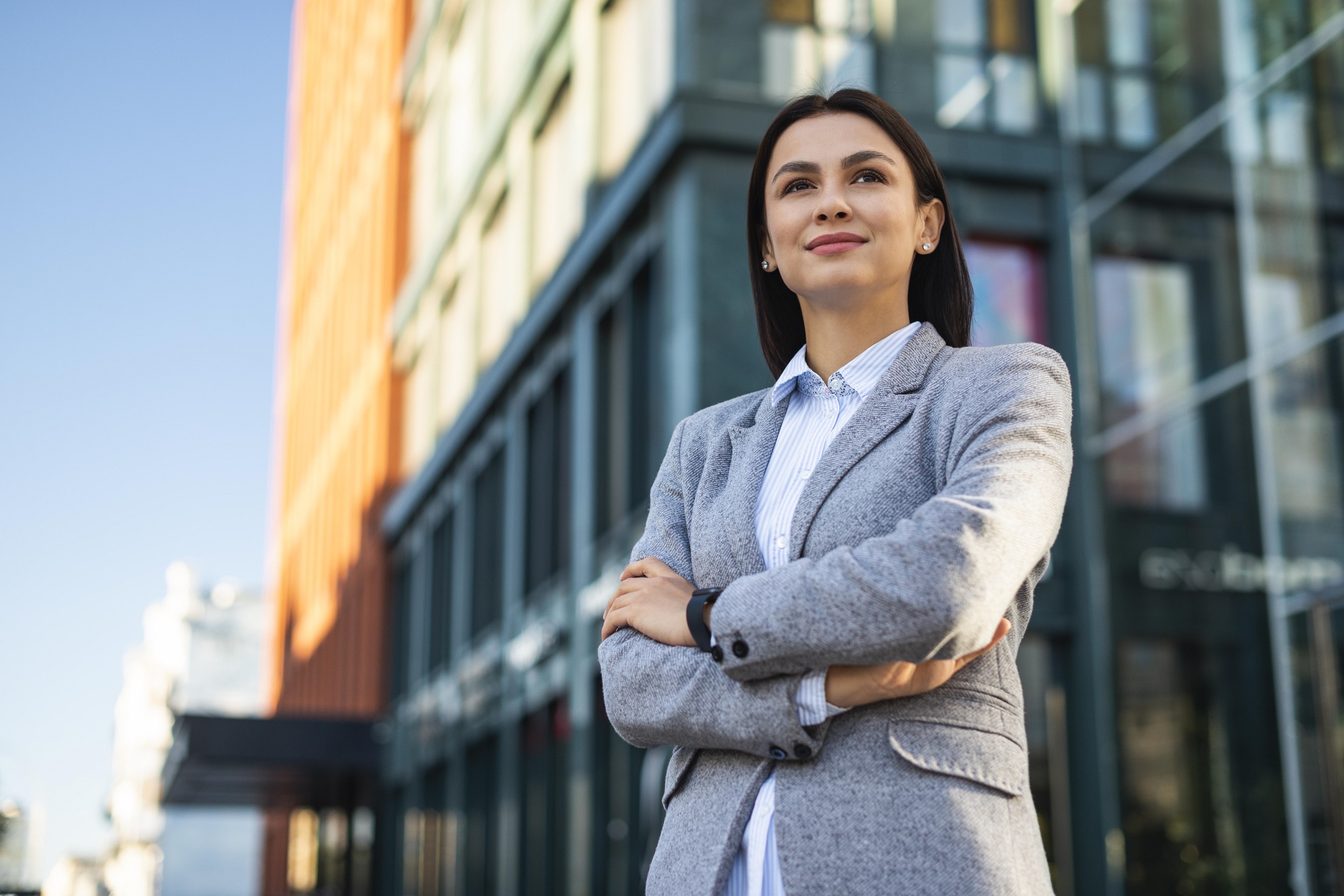 Young professional female outside of an office building