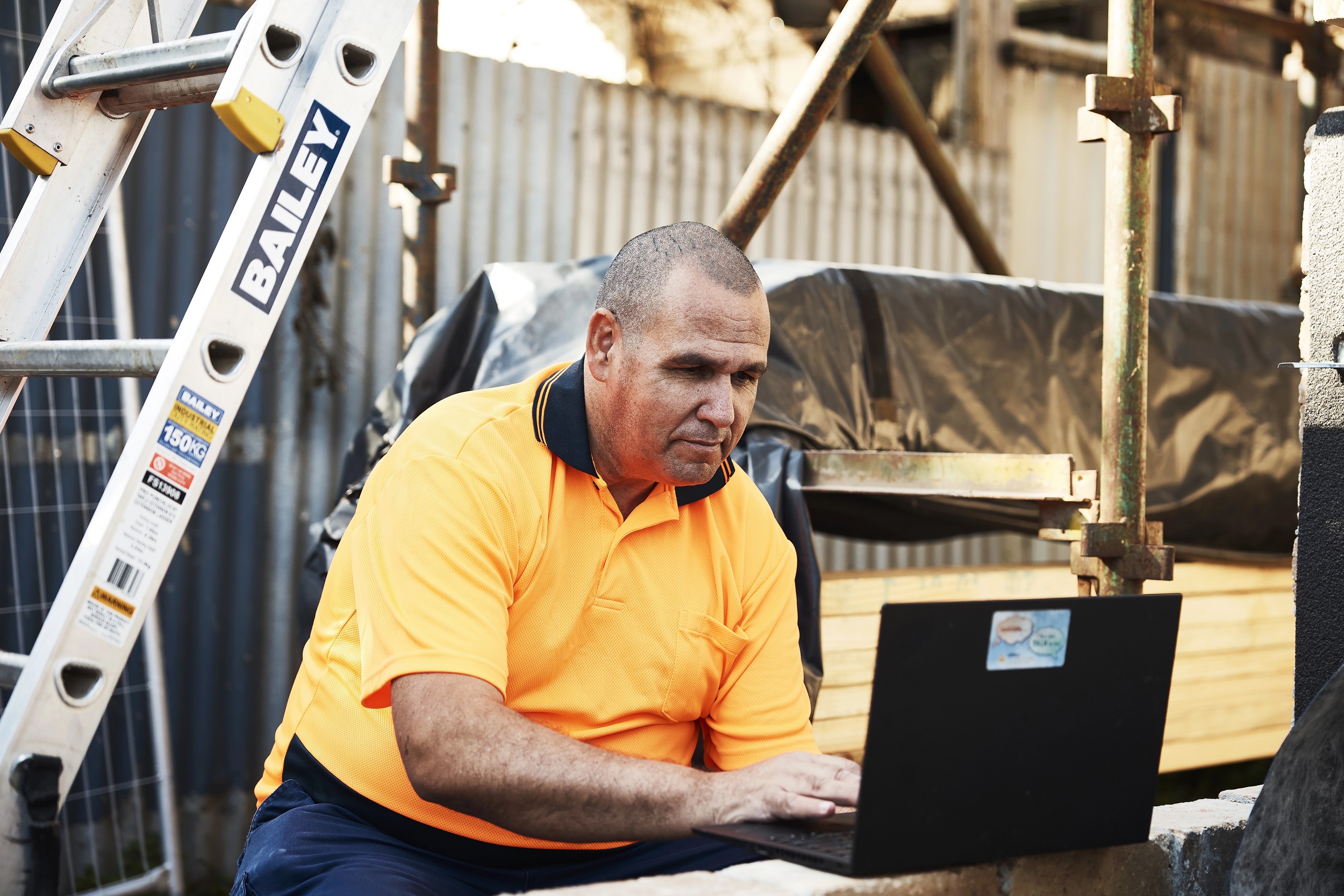 Justin working in his laptop