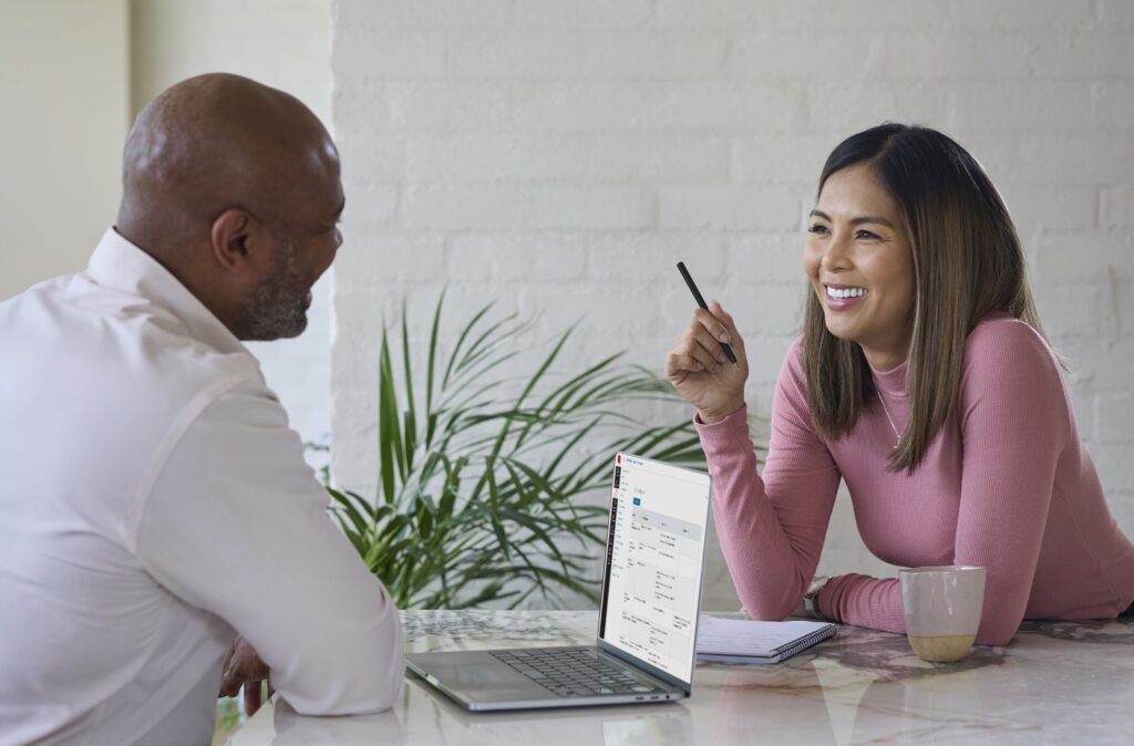 Male and female colleague in a meeting. 